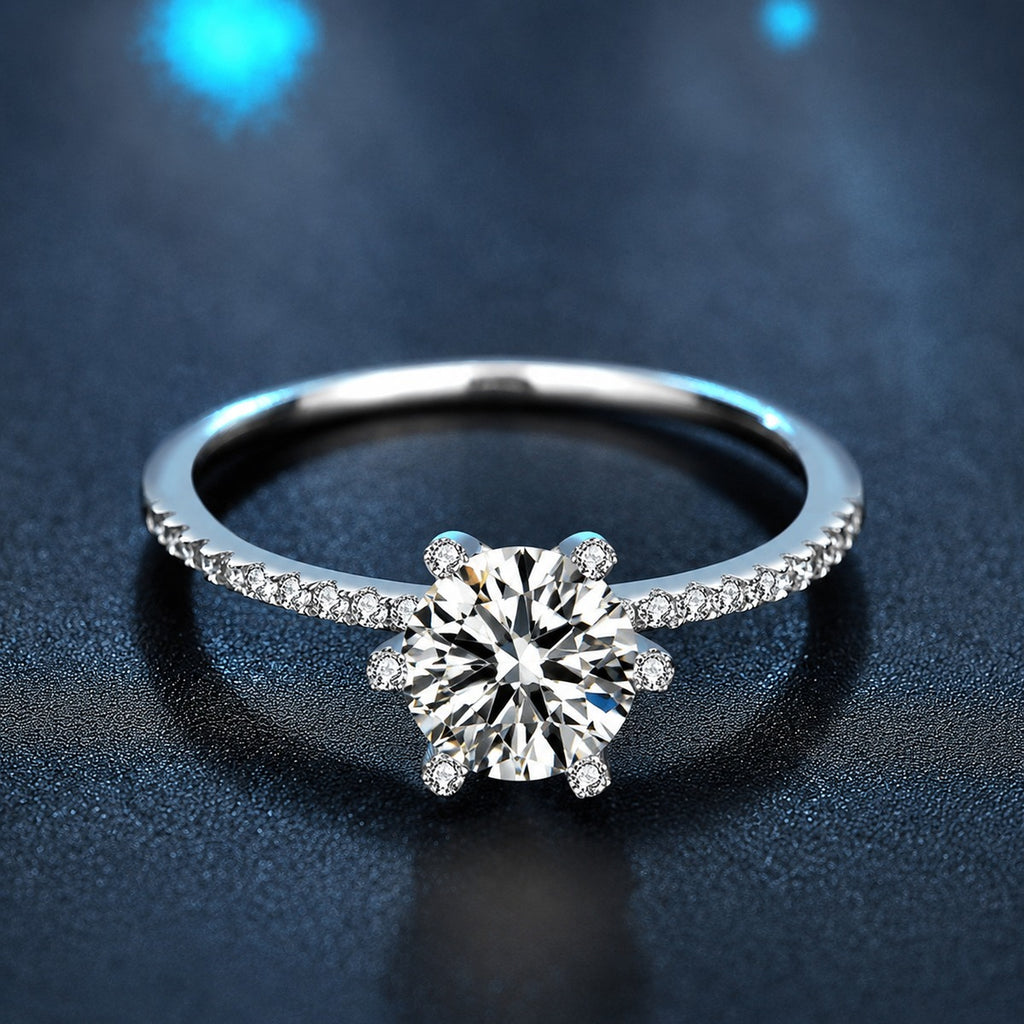 Classic Six-Prong Round Moissanite Engagement Ring with CZ product view showing moissanite setting and metal finish