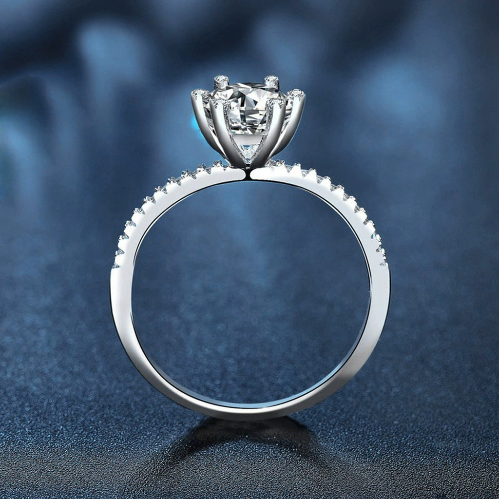 Classic Six-Prong Round Moissanite Engagement Ring with CZ product view showing moissanite setting and metal finish