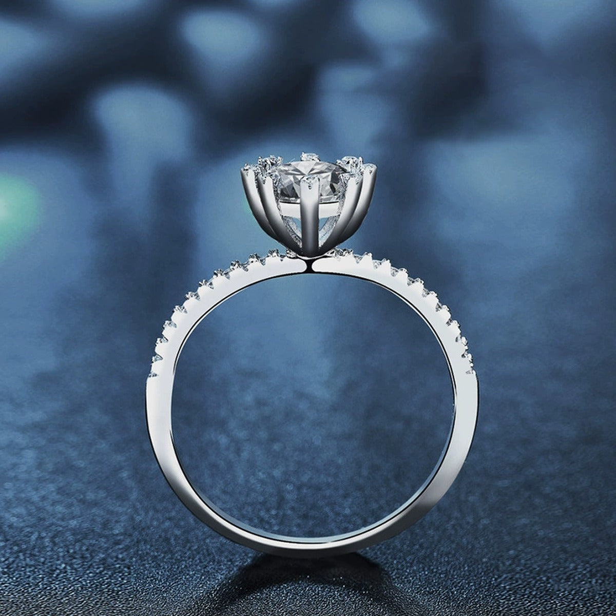 Eight-Prong Round Moissanite Engagement Ring with CZ close-up detail view with moissanite sparkle