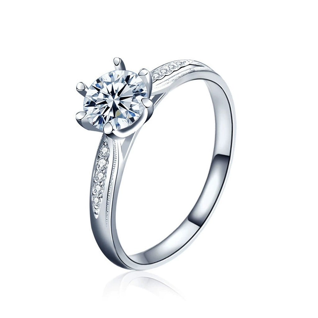 Six-Prong Round Moissanite Engagement Ring with CZ in white gold-plated S925 sterling silver on clean white background
