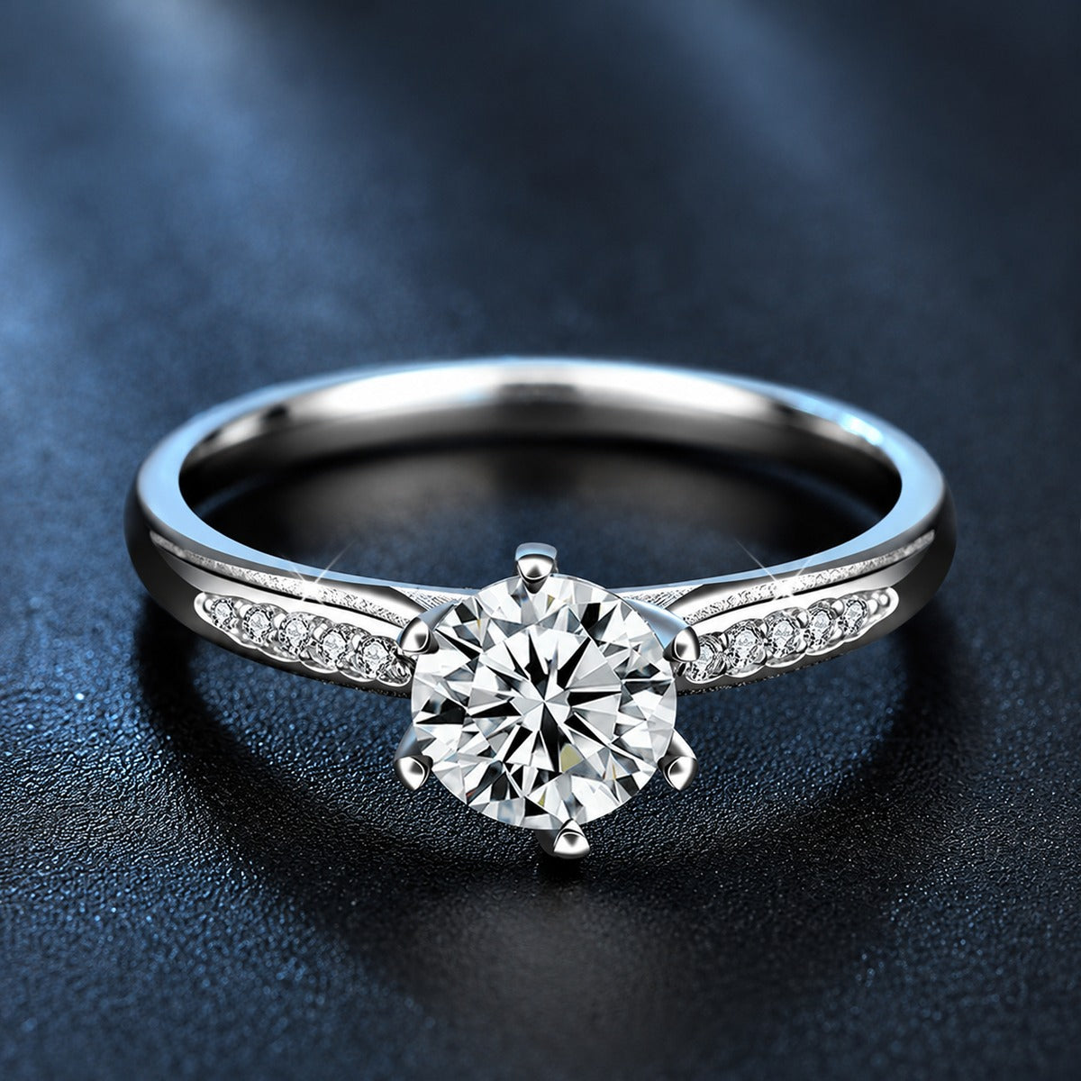 Six-Prong Round Moissanite Engagement Ring with CZ product view showing moissanite setting and metal finish