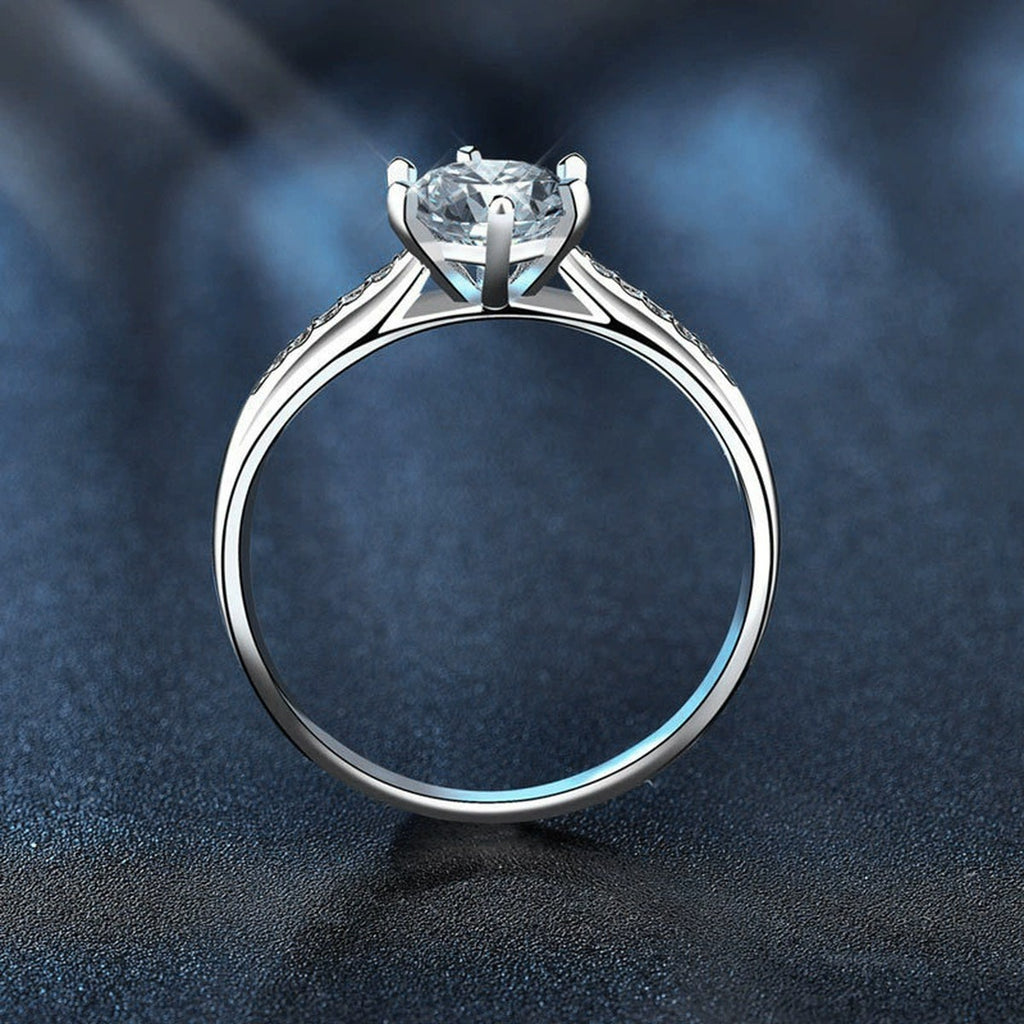 Six-Prong Round Moissanite Engagement Ring with CZ product view showing moissanite setting and metal finish