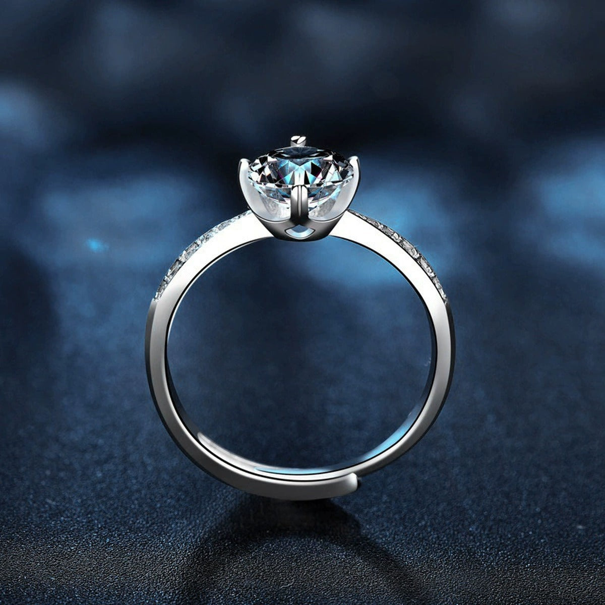 Six-Prong Round Moissanite Adjustable Engagement Ring with CZ close-up detail view with moissanite sparkle