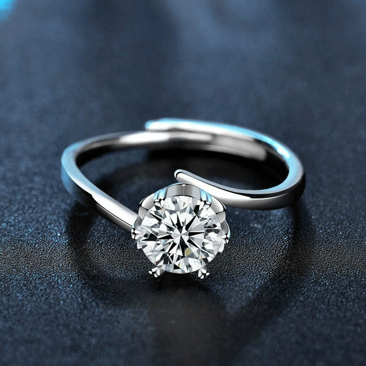 Twist Band Round Moissanite Adjustable Engagement Ring product view showing moissanite setting and metal finish