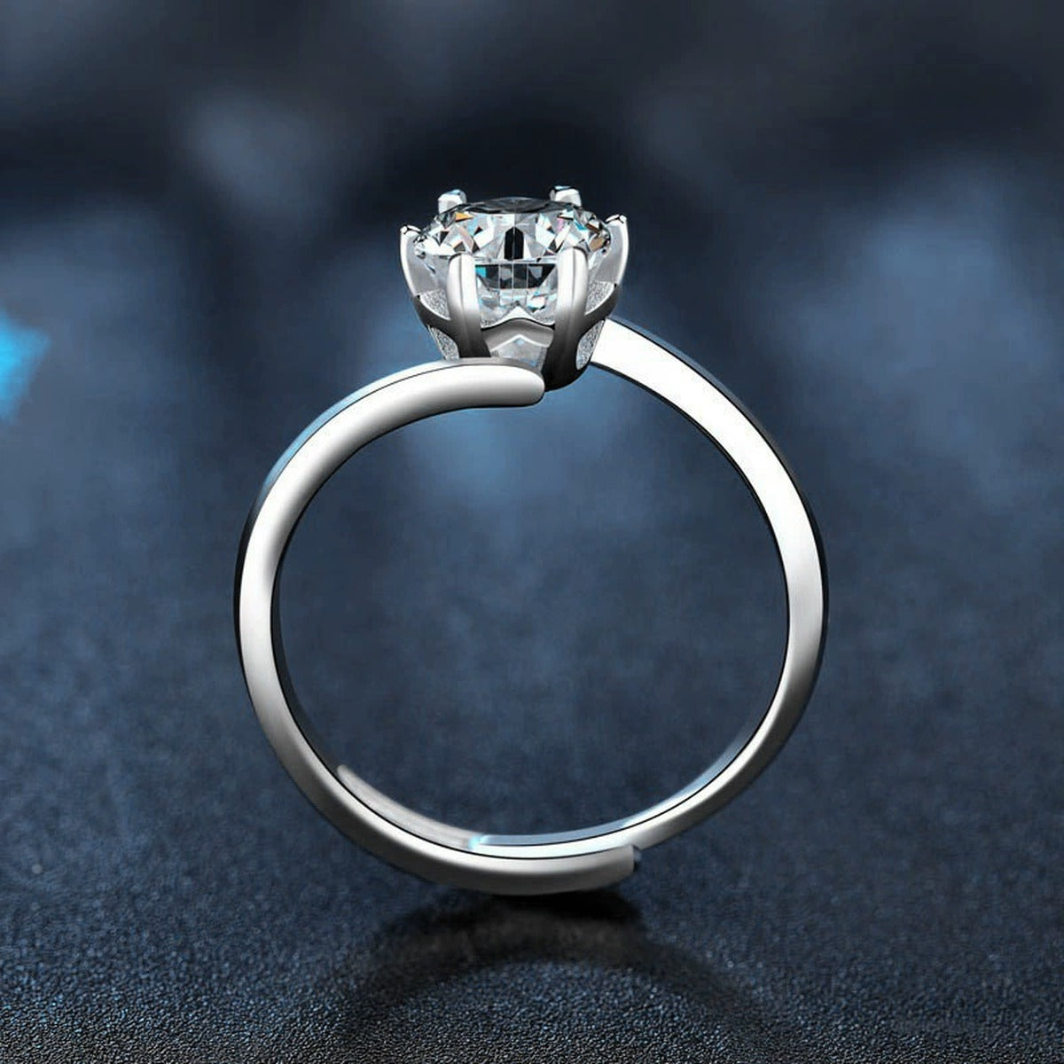Twist Band Round Moissanite Adjustable Engagement Ring product view showing moissanite setting and metal finish