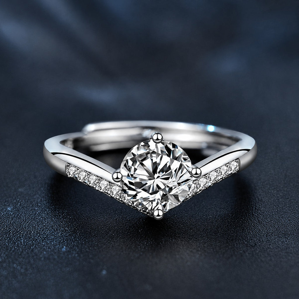 Four-Prong Round Moissanite Adjustable Engagement Ring with CZ close-up detail view with moissanite sparkle