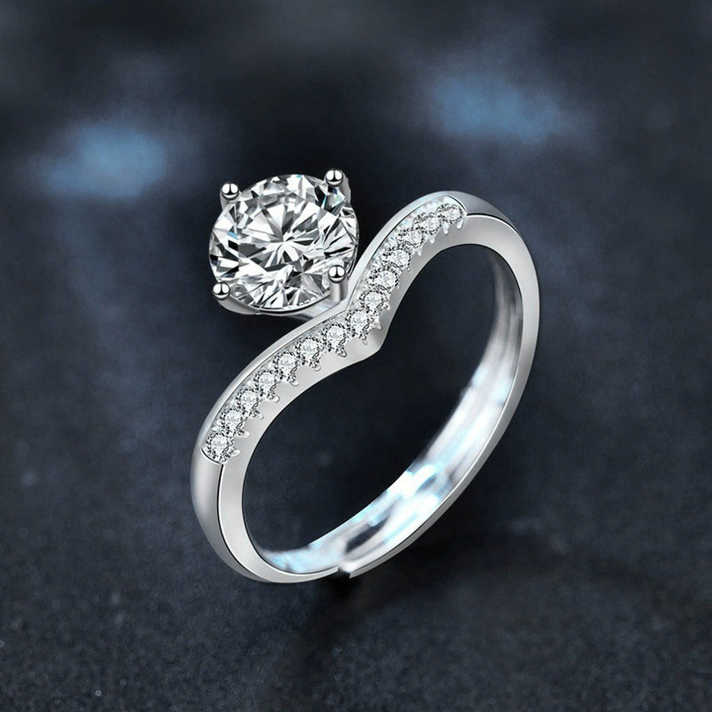 Four-Prong Round Moissanite Adjustable Engagement Ring with CZ close-up detail view with moissanite sparkle