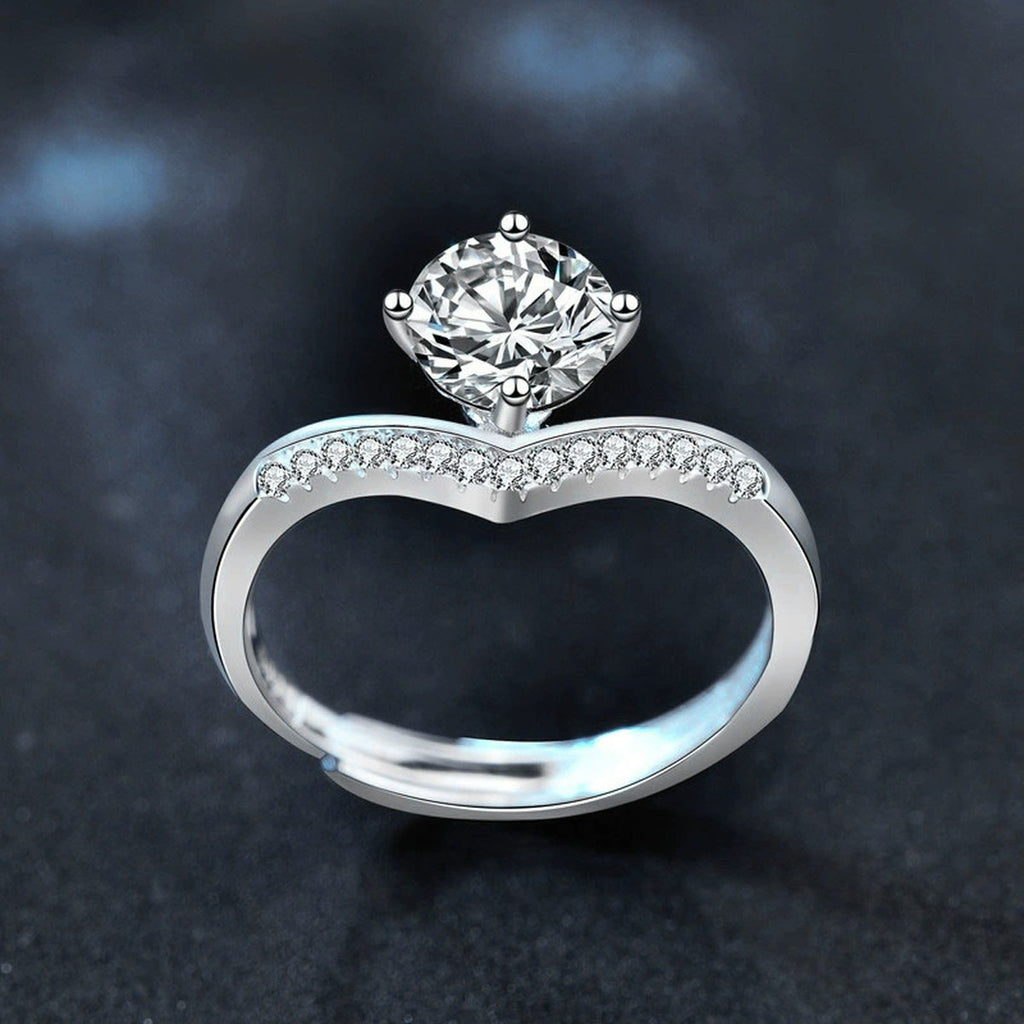 Four-Prong Round Moissanite Adjustable Engagement Ring with CZ close-up detail view with moissanite sparkle
