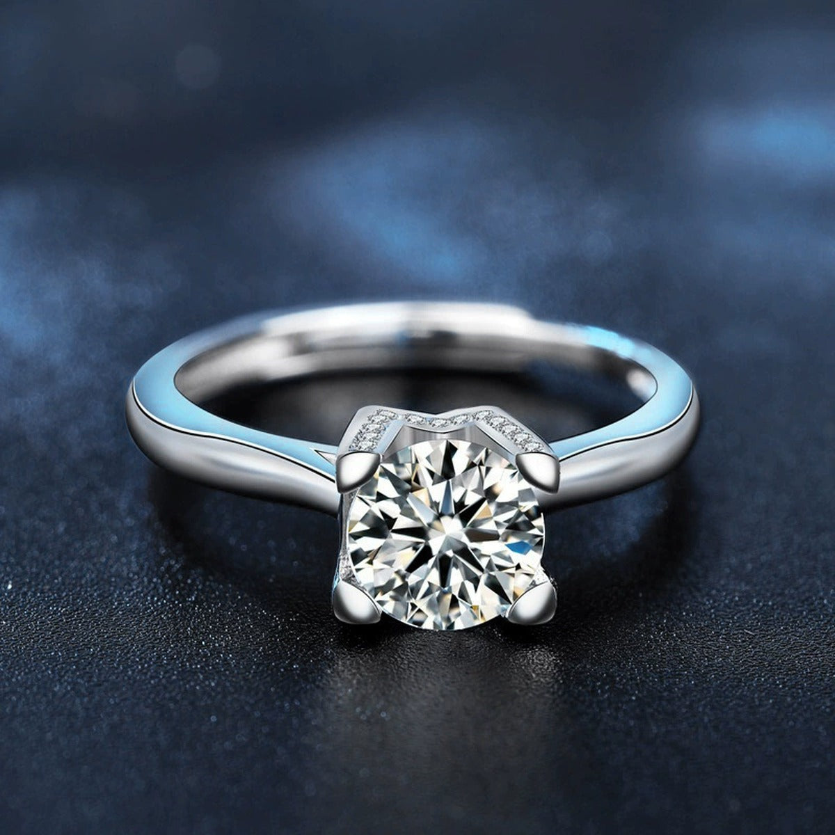 W-Motif Four-Prong Round Moissanite Adjustable Engagement Ring with CZ product view showing moissanite setting and metal finish