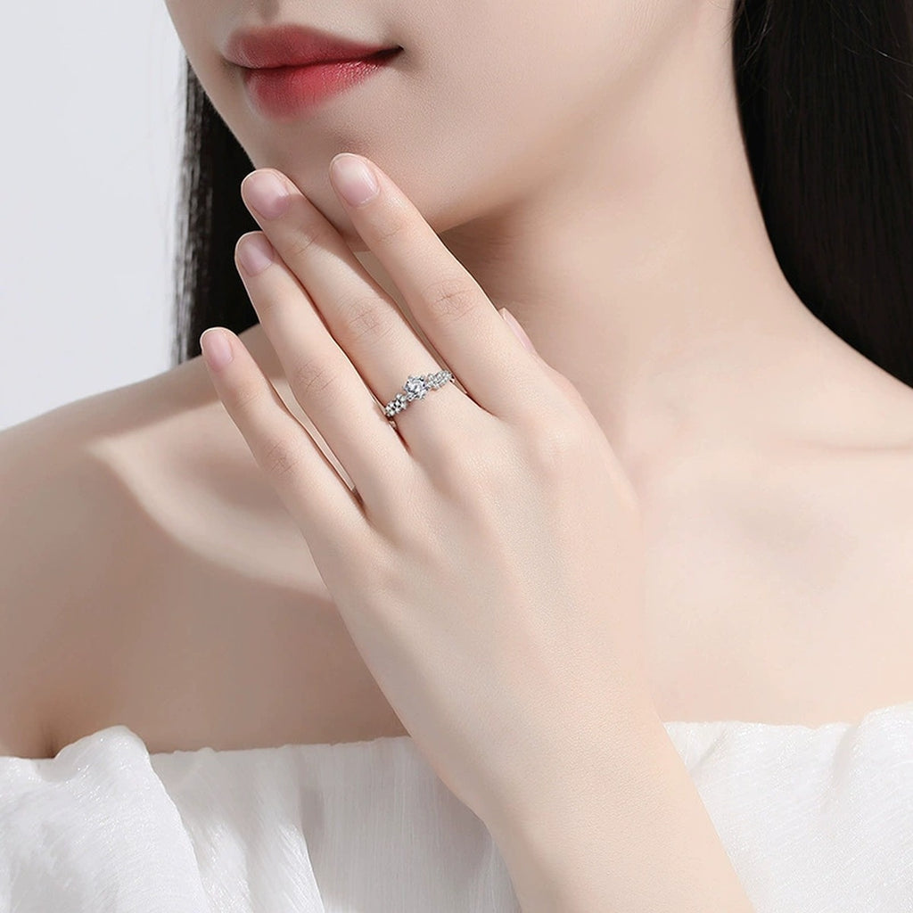 Starry Round Moissanite Fashion Ring with CZ worn on hand to show scale, band width, and ring profile