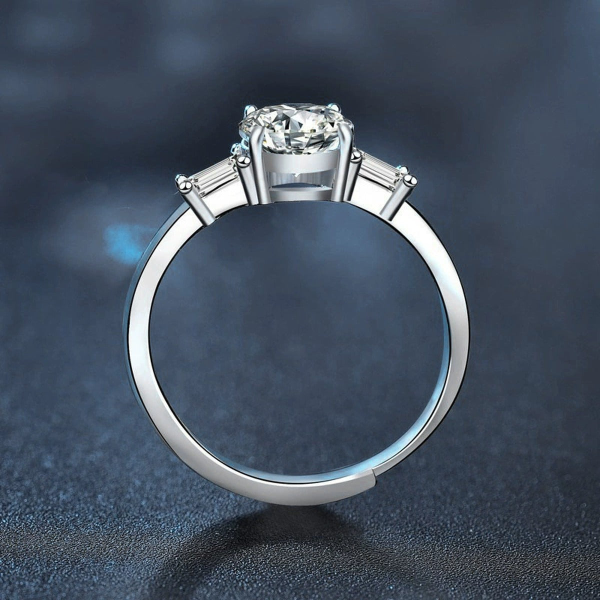 Four-Prong Round Moissanite Adjustable Engagement Ring with CZ close-up detail view with moissanite sparkle