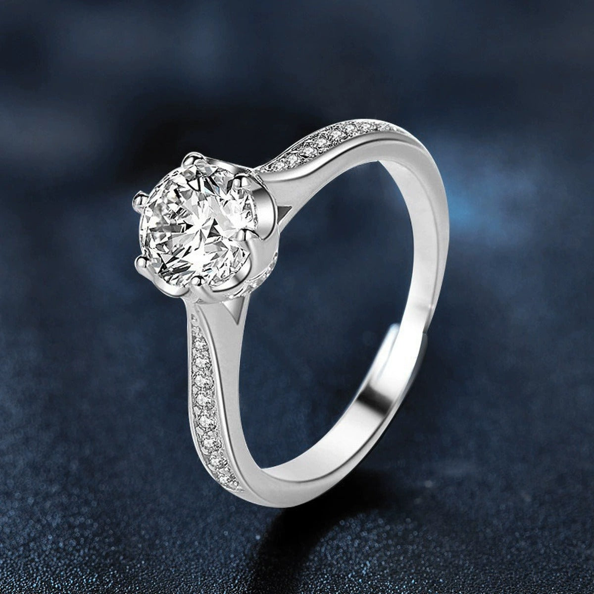 Bud Six-Prong Round Moissanite Adjustable Engagement Ring with CZ close-up detail view with moissanite sparkle