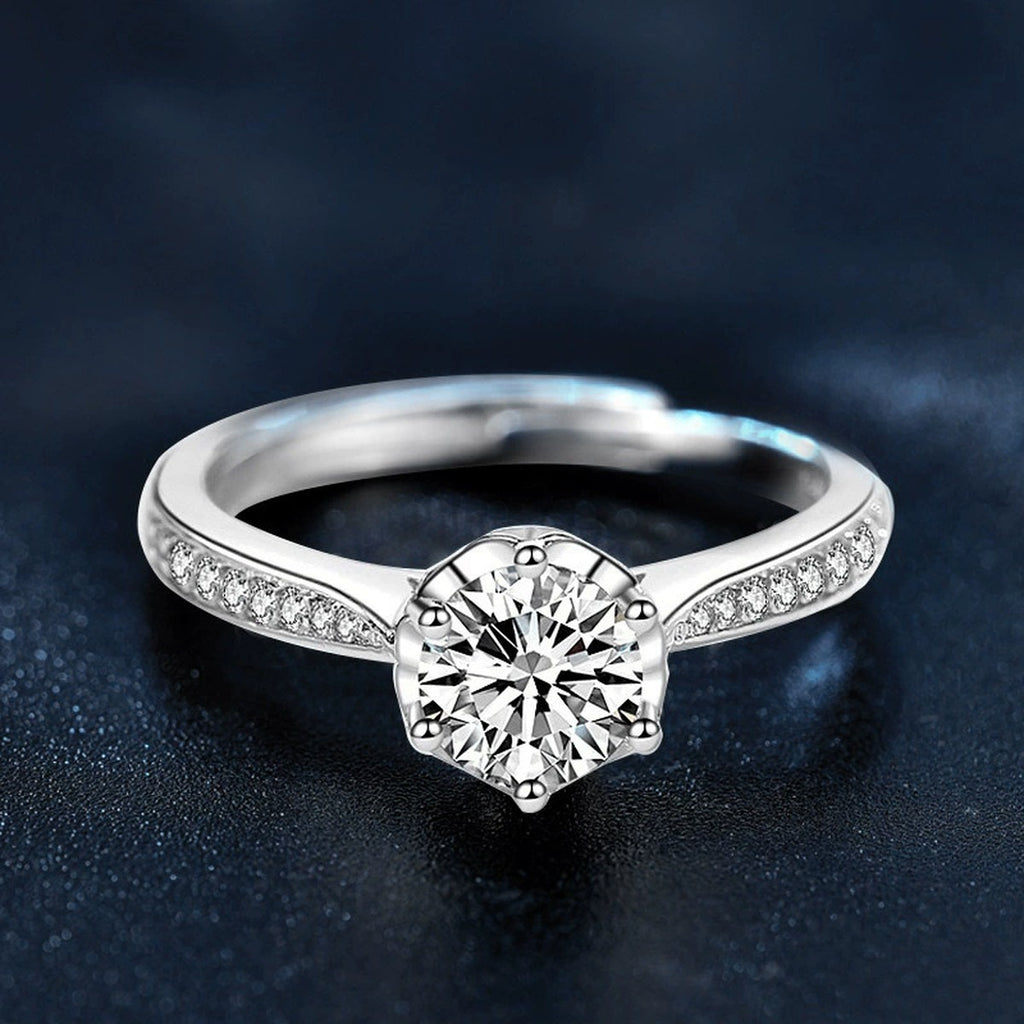 Bud Six-Prong Round Moissanite Adjustable Engagement Ring with CZ close-up detail view with moissanite sparkle