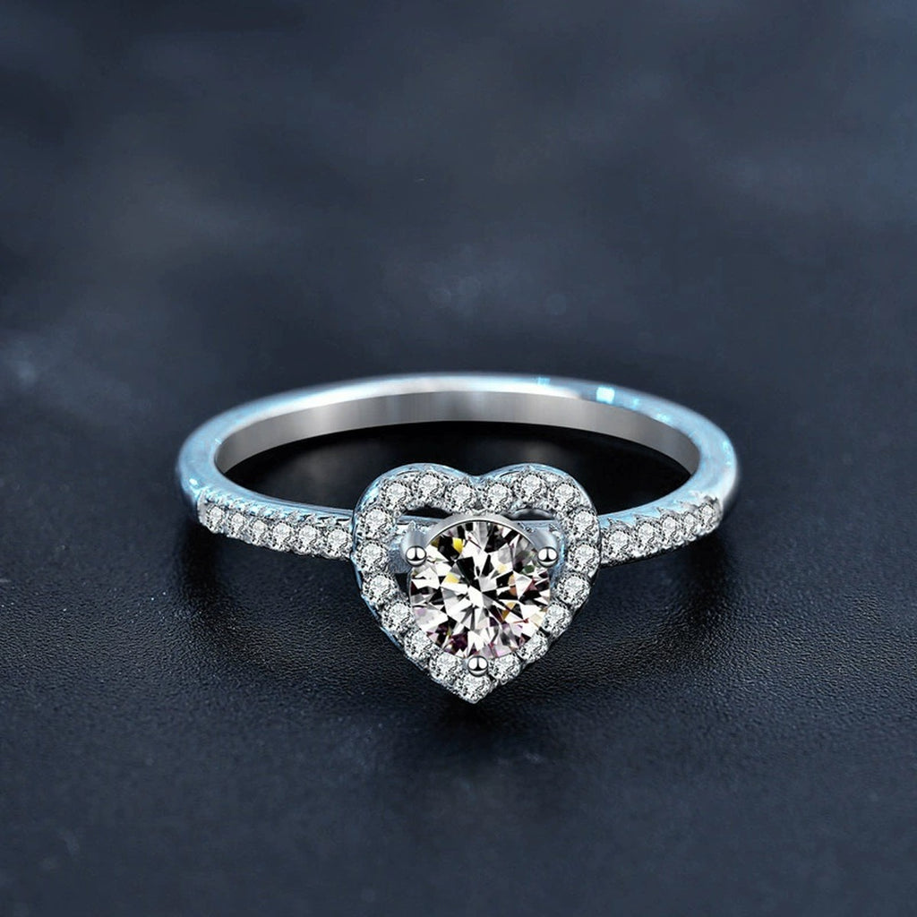 Heart Motif Three-Prong Round Moissanite Engagement Ring with CZ close-up detail view with moissanite sparkle