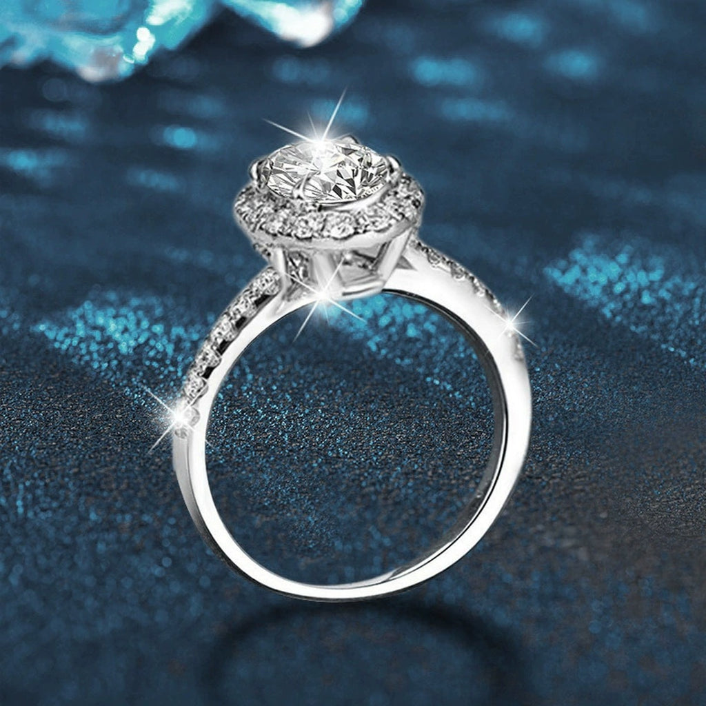 Oval Cut Moissanite Halo Engagement Ring with CZ close-up detail view with moissanite sparkle
