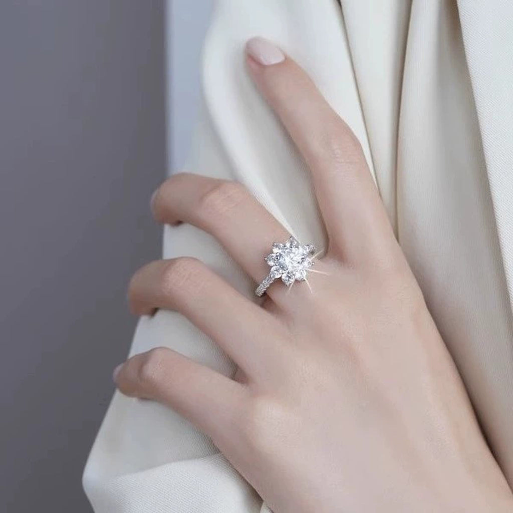 Snowflake Round Moissanite Adjustable Engagement Ring with CZ worn on hand to show scale, band width, and ring profile