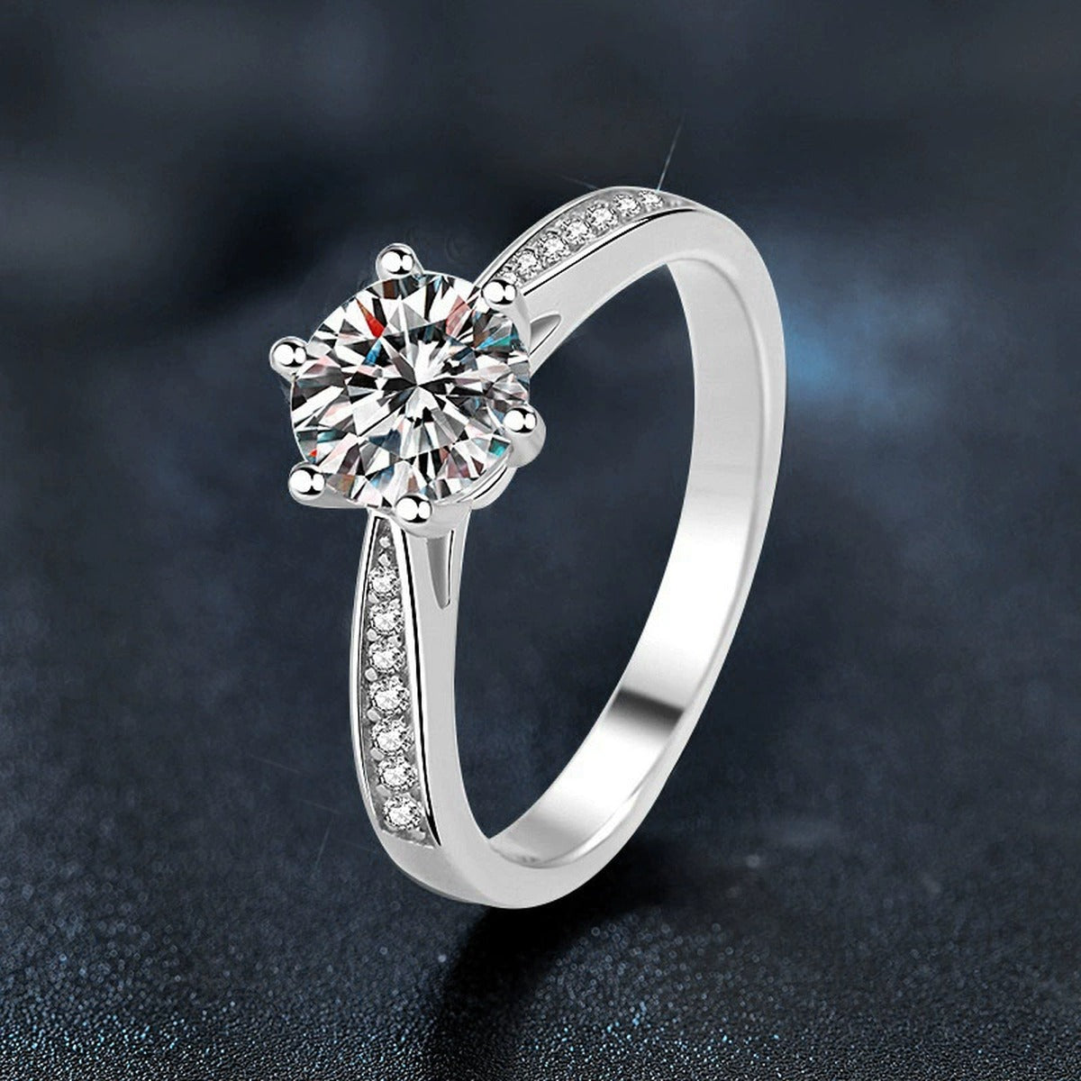 Six-Prong Round Moissanite Engagement Ring with CZ product view showing moissanite setting and metal finish