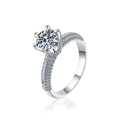 Six-Prong Round Moissanite Engagement Ring with CZ in white gold-plated S925 sterling silver on clean white background