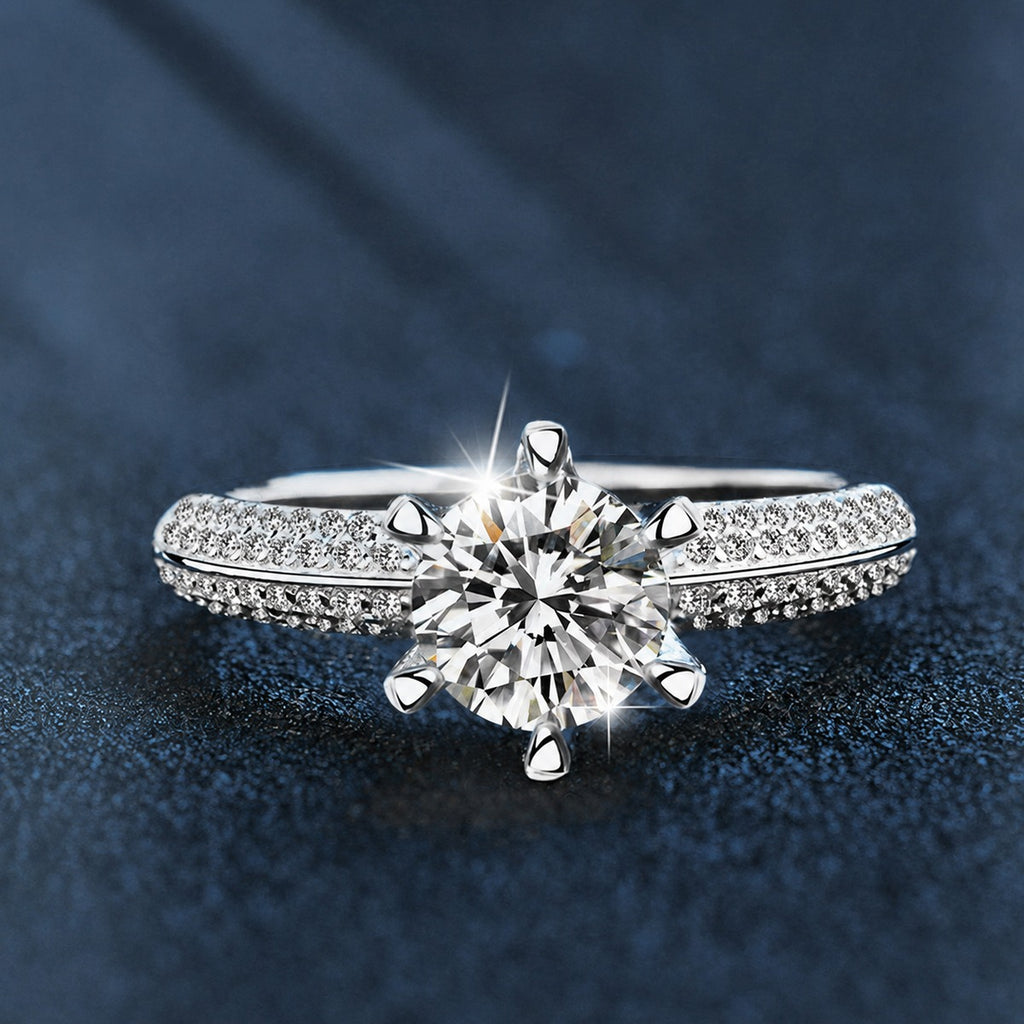 Six-Prong Round Moissanite Engagement Ring with CZ close-up detail view with moissanite sparkle