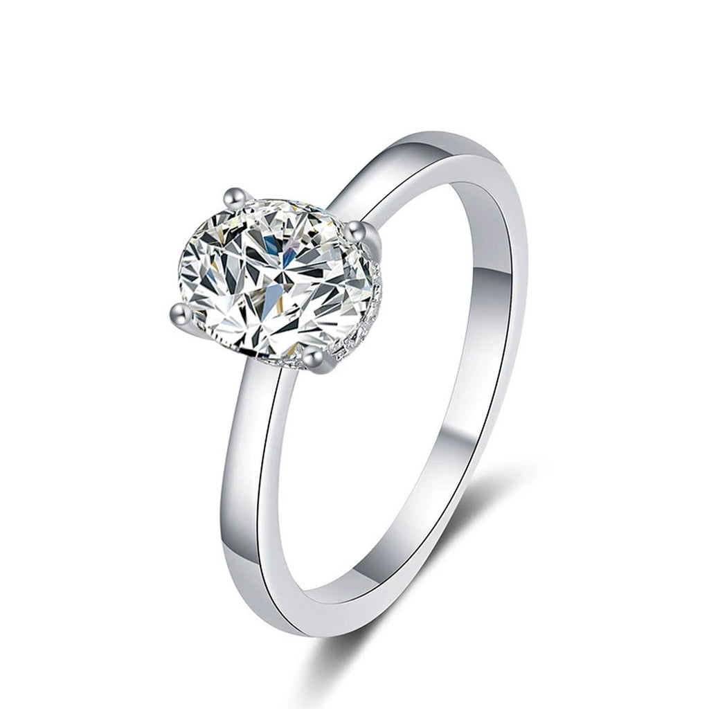 Four-Prong Oval Moissanite Solitaire Engagement Ring in white gold-plated S925 sterling silver on clean white background