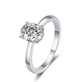 Four-Prong Oval Moissanite Solitaire Engagement Ring in white gold-plated S925 sterling silver on clean white background
