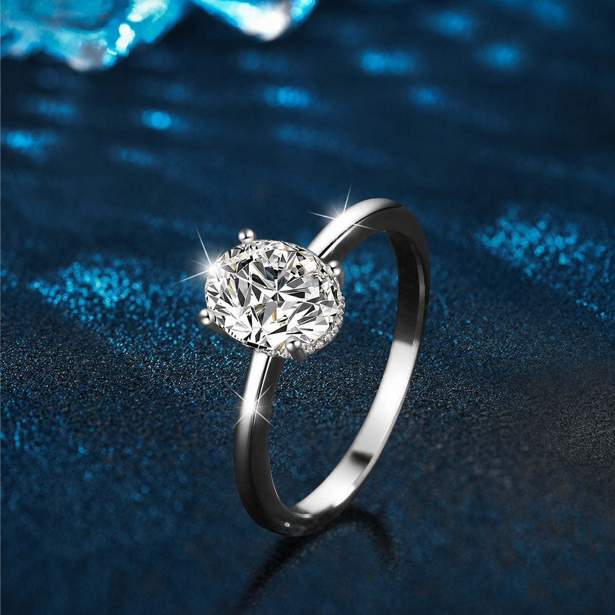 Four-Prong Oval Moissanite Solitaire Engagement Ring close-up detail view with moissanite sparkle