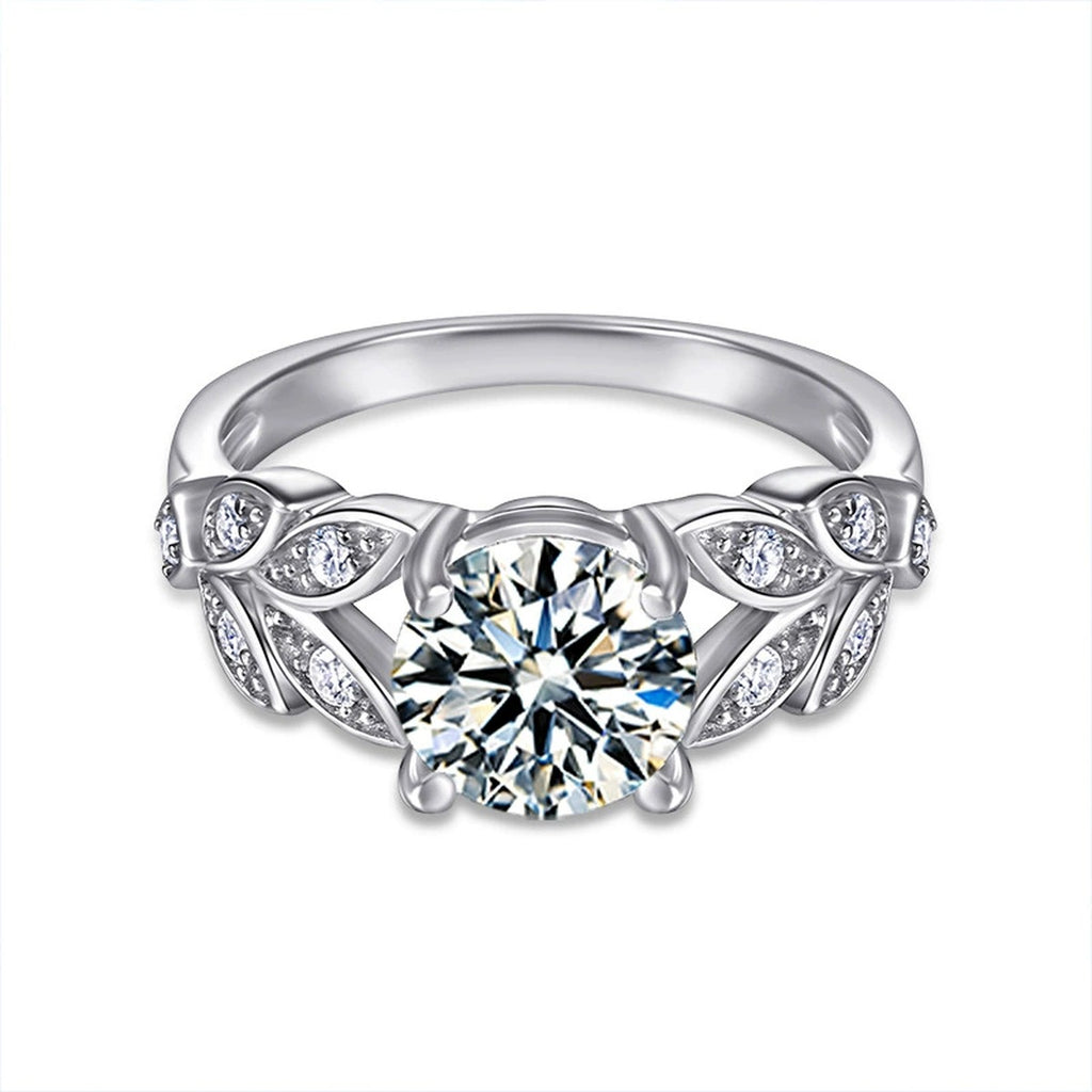 Leaf Motif Four-Prong Round Moissanite Engagement Ring with CZ in white gold-plated S925 sterling silver on clean white background