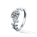 Leaf Vine Four-Prong Round Moissanite Engagement Ring with CZ in white gold-plated S925 sterling silver on clean white background