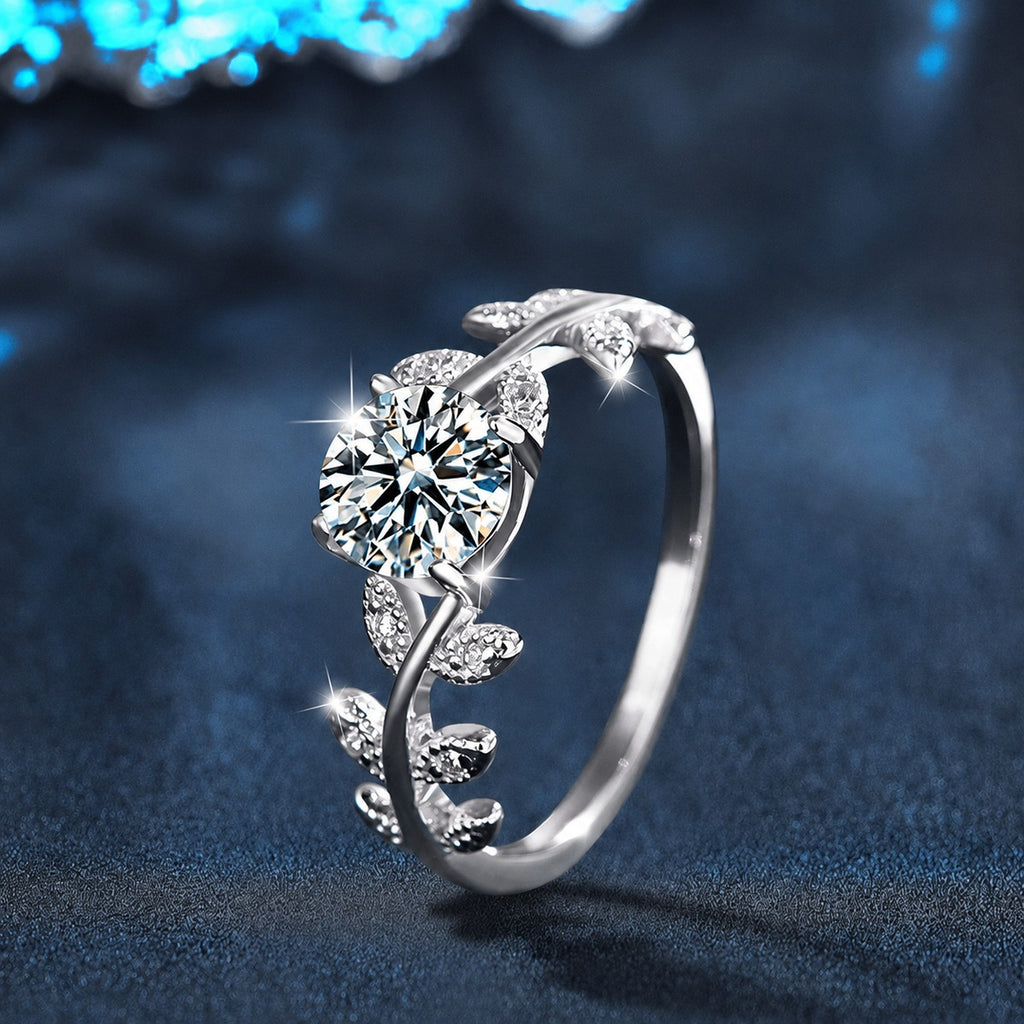 Leaf Vine Four-Prong Round Moissanite Engagement Ring with CZ close-up detail view with moissanite sparkle
