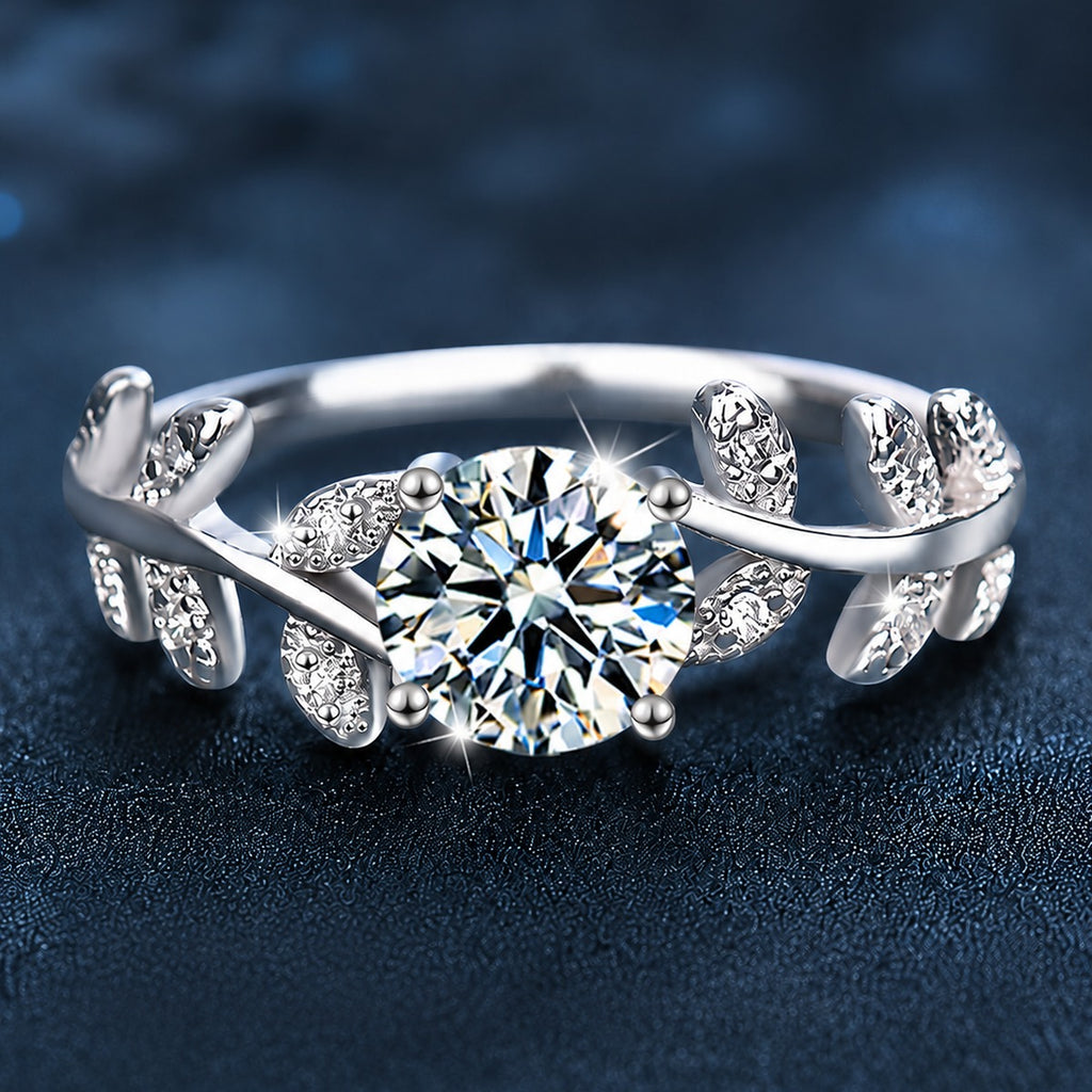 Leaf Vine Four-Prong Round Moissanite Engagement Ring with CZ close-up detail view with moissanite sparkle