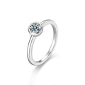 Bezel Round Moissanite Wedding Ring in white gold-plated S925 sterling silver on clean white background