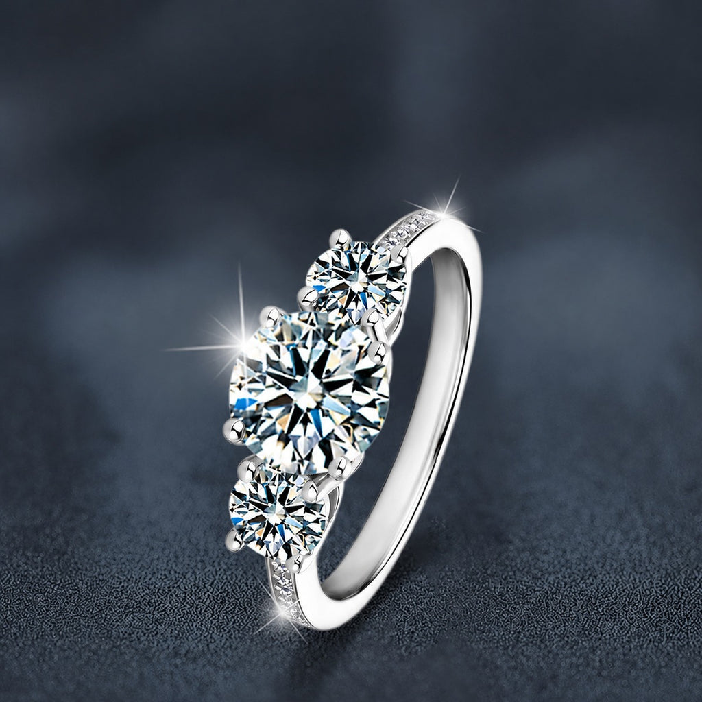 Graduated Round Moissanite Engagement Ring with CZ close-up detail view with moissanite sparkle