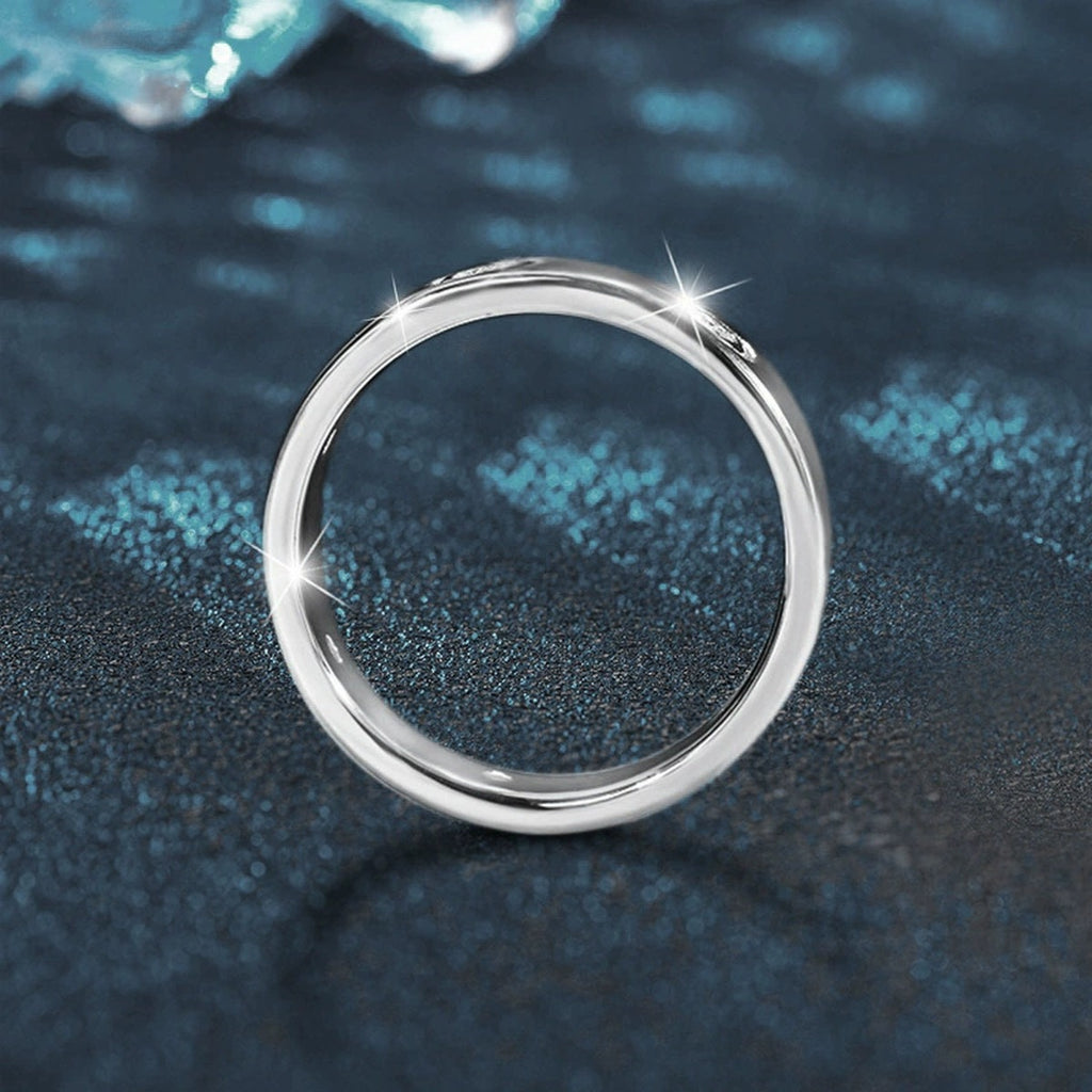 Bezel-Set Round Moissanite Wide Wedding Band close-up detail view with moissanite sparkle