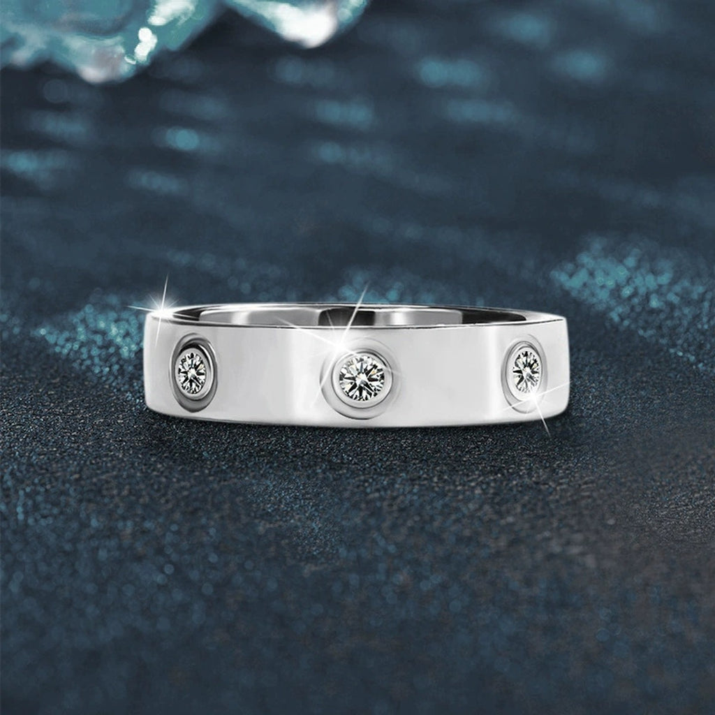 Bezel-Set Round Moissanite Wide Wedding Band close-up detail view with moissanite sparkle