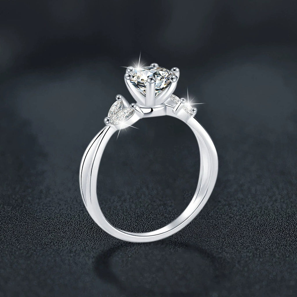 Floral Six-Prong Round Moissanite Engagement Ring with CZ close-up detail view with moissanite sparkle