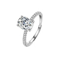 Four-Prong Oval Moissanite Engagement Ring with CZ in white gold-plated S925 sterling silver on clean white background