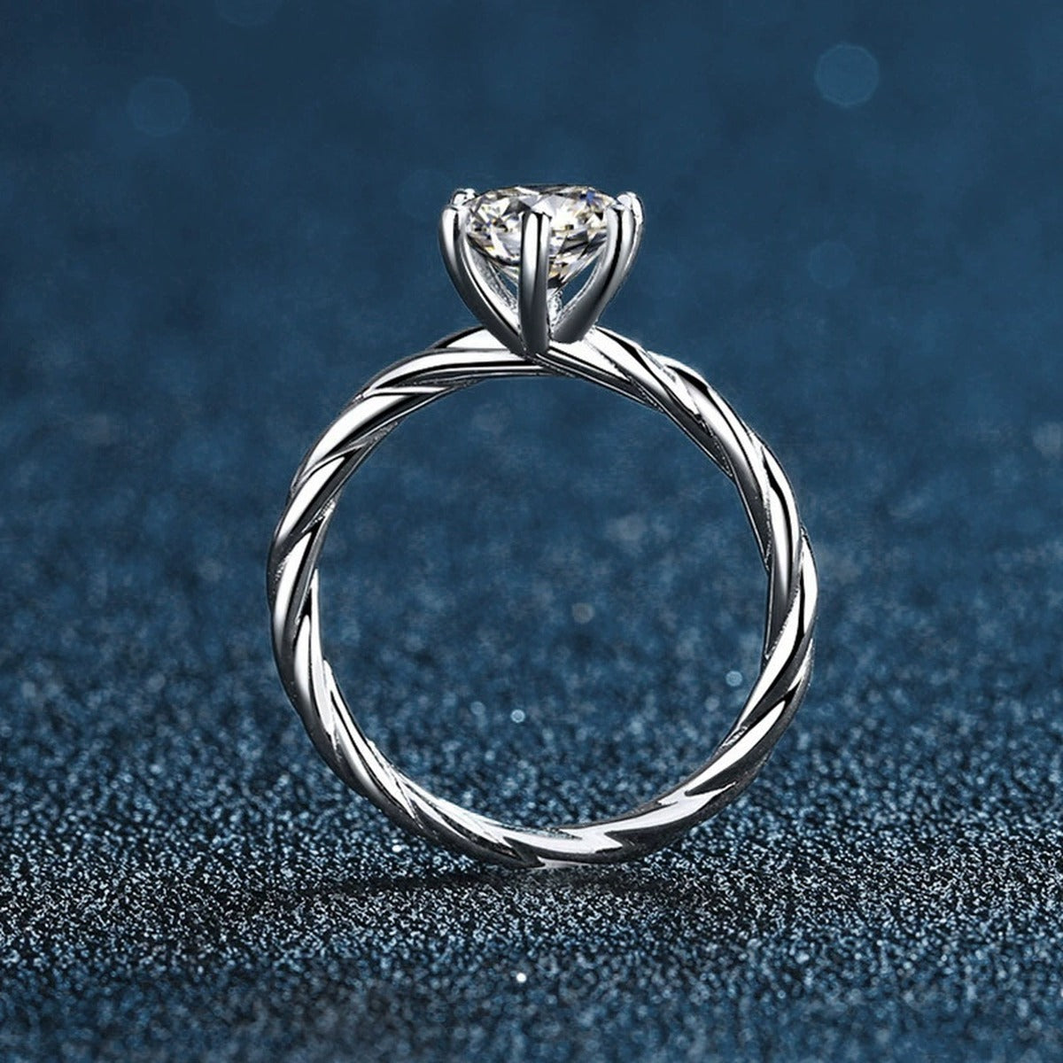 Six-Prong Round Moissanite Twist Engagement Ring close-up detail view with moissanite sparkle