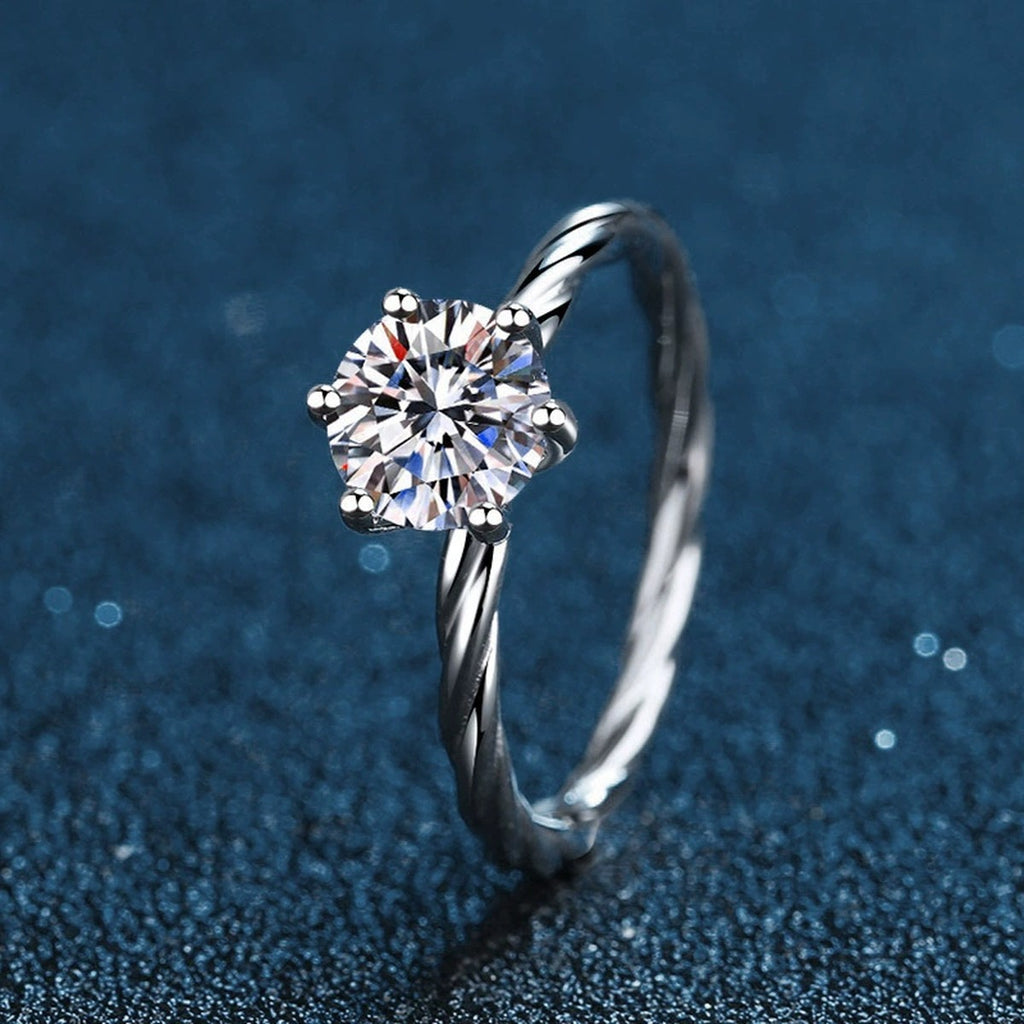 Six-Prong Round Moissanite Twist Engagement Ring close-up detail view with moissanite sparkle
