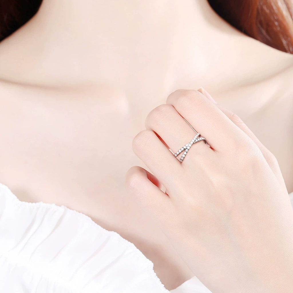 Twist Round Moissanite Wedding Band worn on hand to show scale, band width, and ring profile