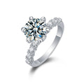 Six-Prong Round Moissanite Engagement Ring with CZ in white gold-plated S925 sterling silver on clean white background