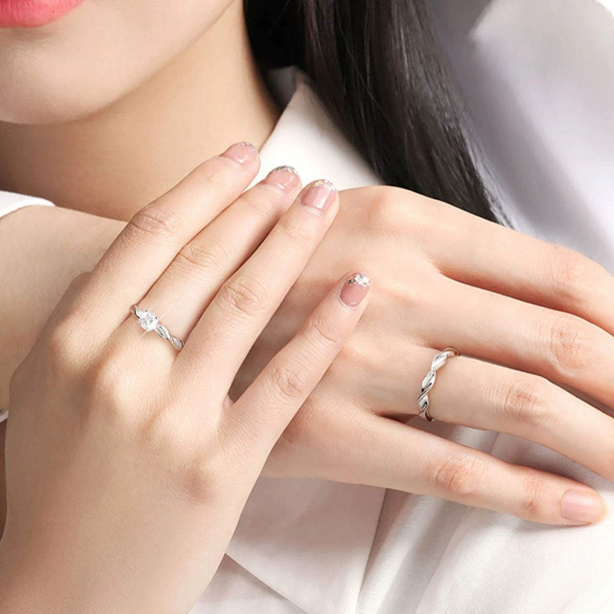 Round Moissanite Couples Wedding Rings worn on hand to show scale, band width, and ring profile