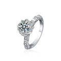 Rose Motif Round Moissanite Engagement Ring with CZ in white gold-plated S925 sterling silver on clean white background