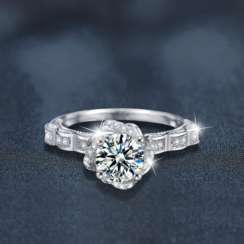 Rose Motif Round Moissanite Engagement Ring with CZ close-up detail view with moissanite sparkle