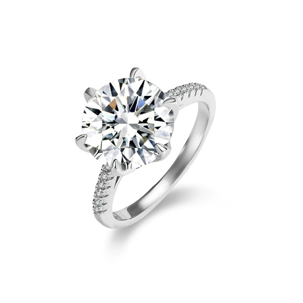 Six-Prong Round Moissanite Engagement Ring with CZ in white gold-plated S925 sterling silver on clean white background