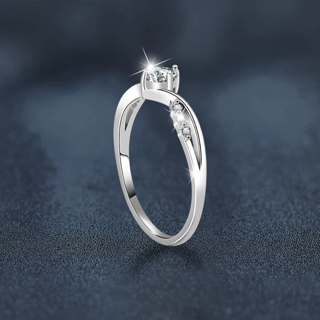 Round Moissanite Twist Engagement Ring with CZ close-up detail view with moissanite sparkle
