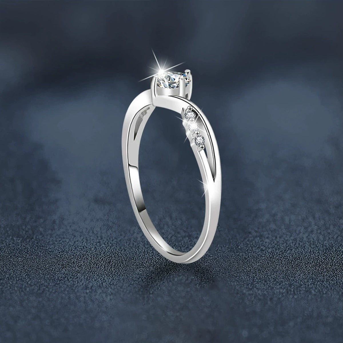 Round Moissanite Twist Engagement Ring with CZ close-up detail view with moissanite sparkle