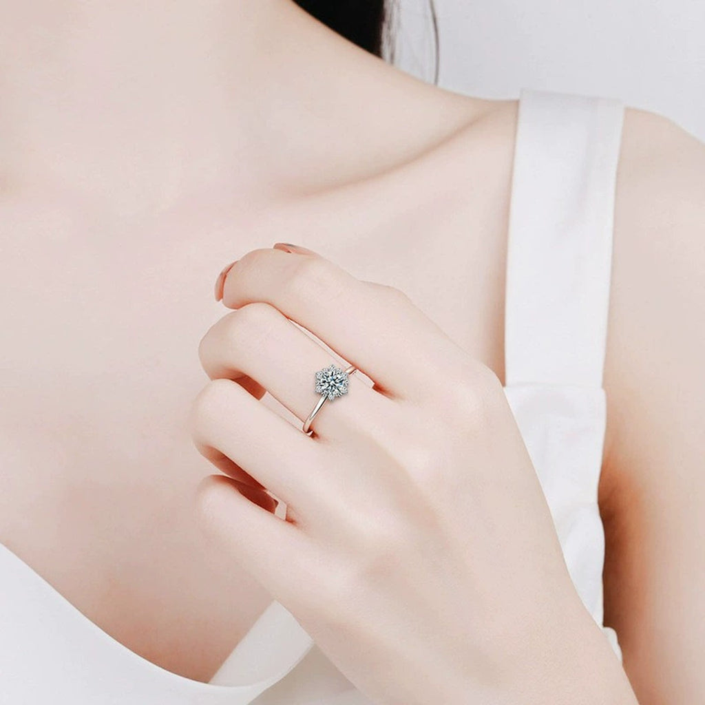 Snowflake Round Moissanite Adjustable Engagement Ring with CZ worn on hand to show scale, band width, and ring profile