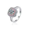 Pink CZ Halo Round Moissanite Engagement Ring in white gold-plated S925 sterling silver on clean white background