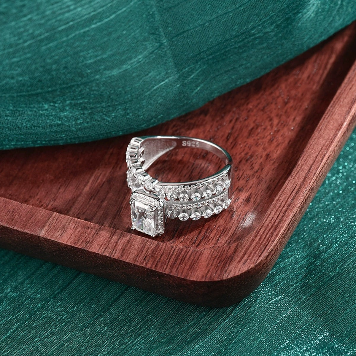 Three-Row Radiant Cut Moissanite Engagement Ring with CZ close-up detail view with moissanite sparkle