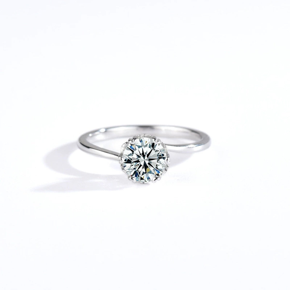 Six-Prong Round Moissanite Solitaire Engagement Ring in white gold-plated S925 sterling silver on clean white background